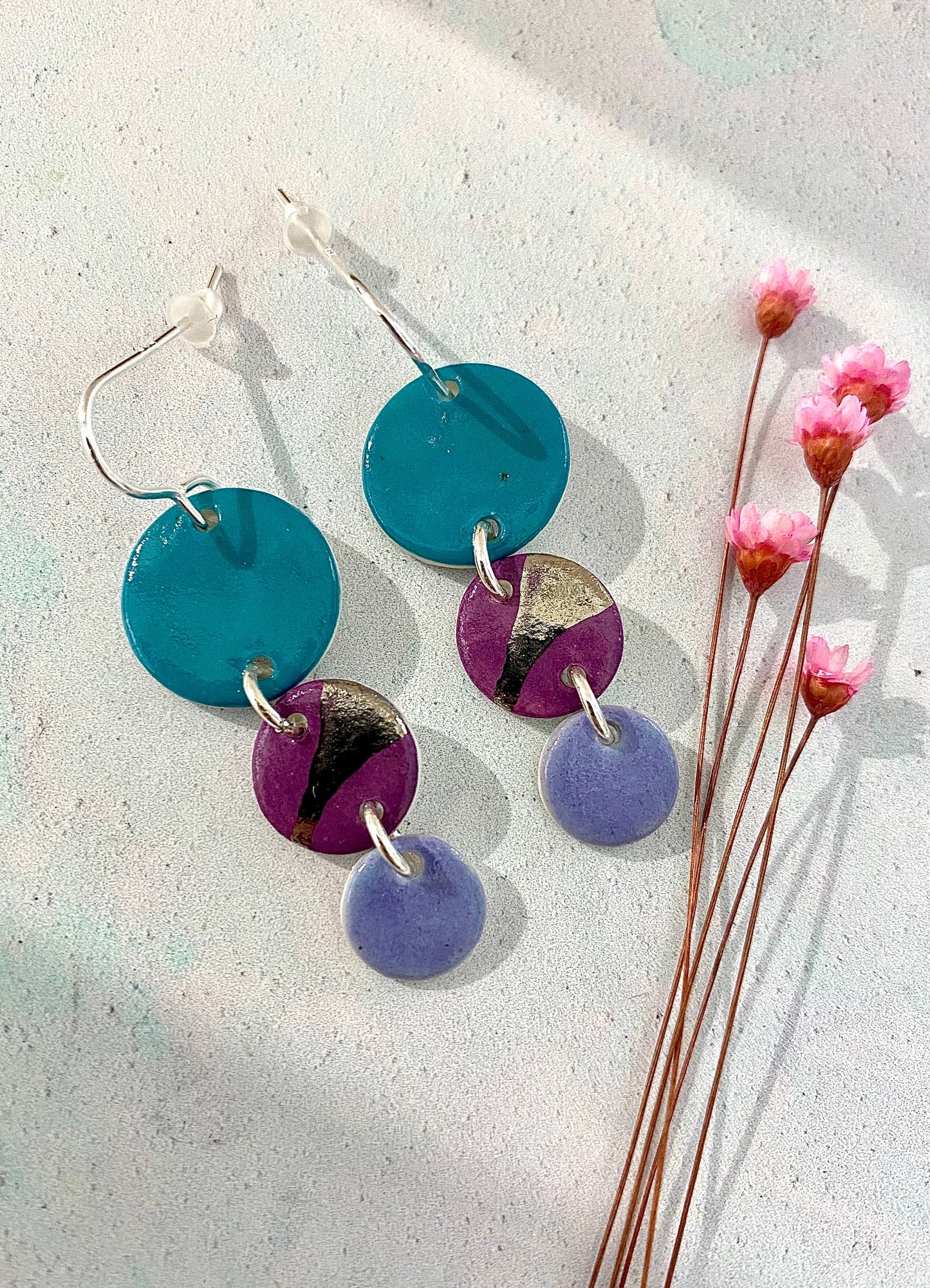 Long Coloured Disc Earrings with Platinum Detailing