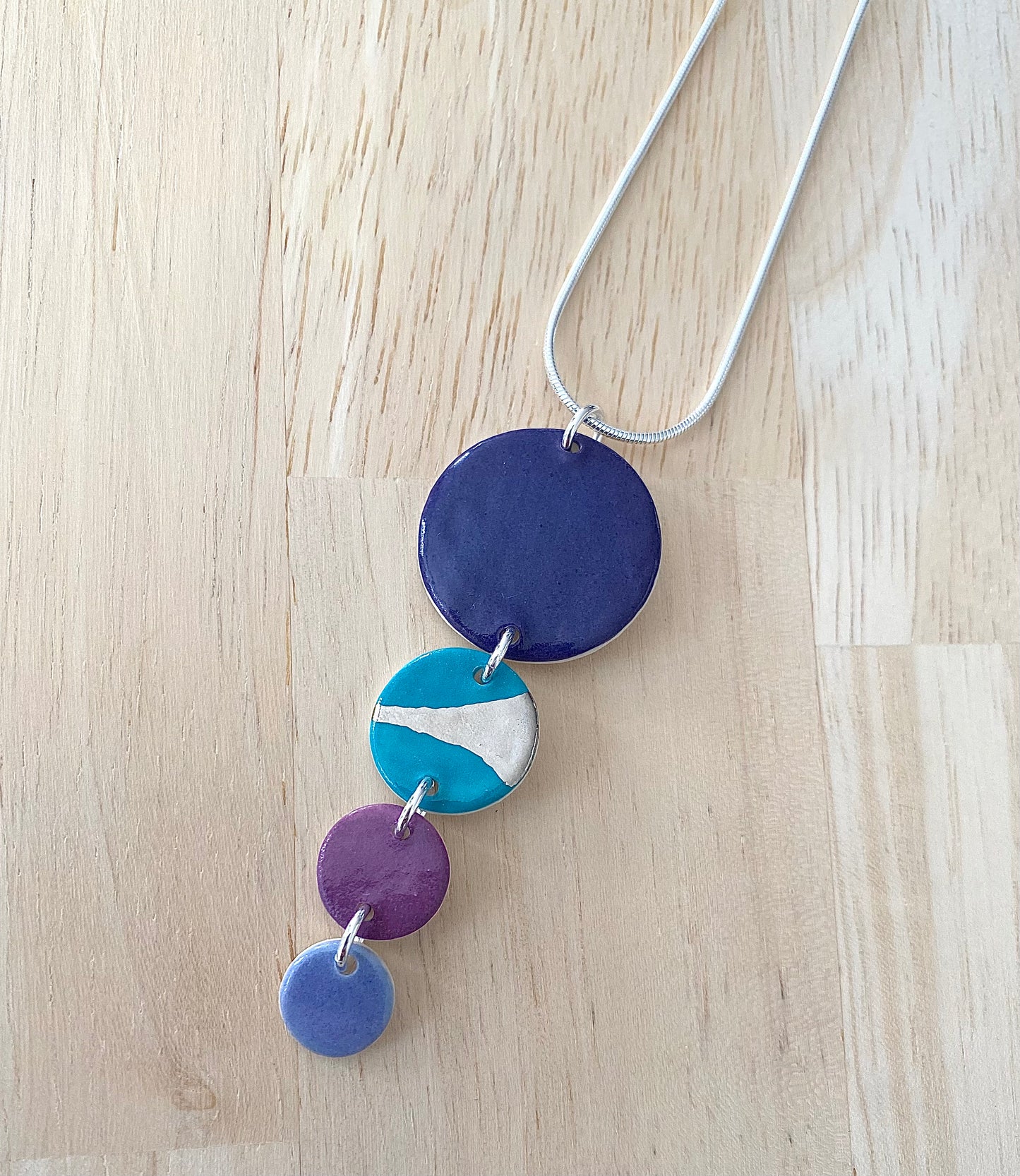 Disc Necklace with Platinum Detailing (4 Discs)
