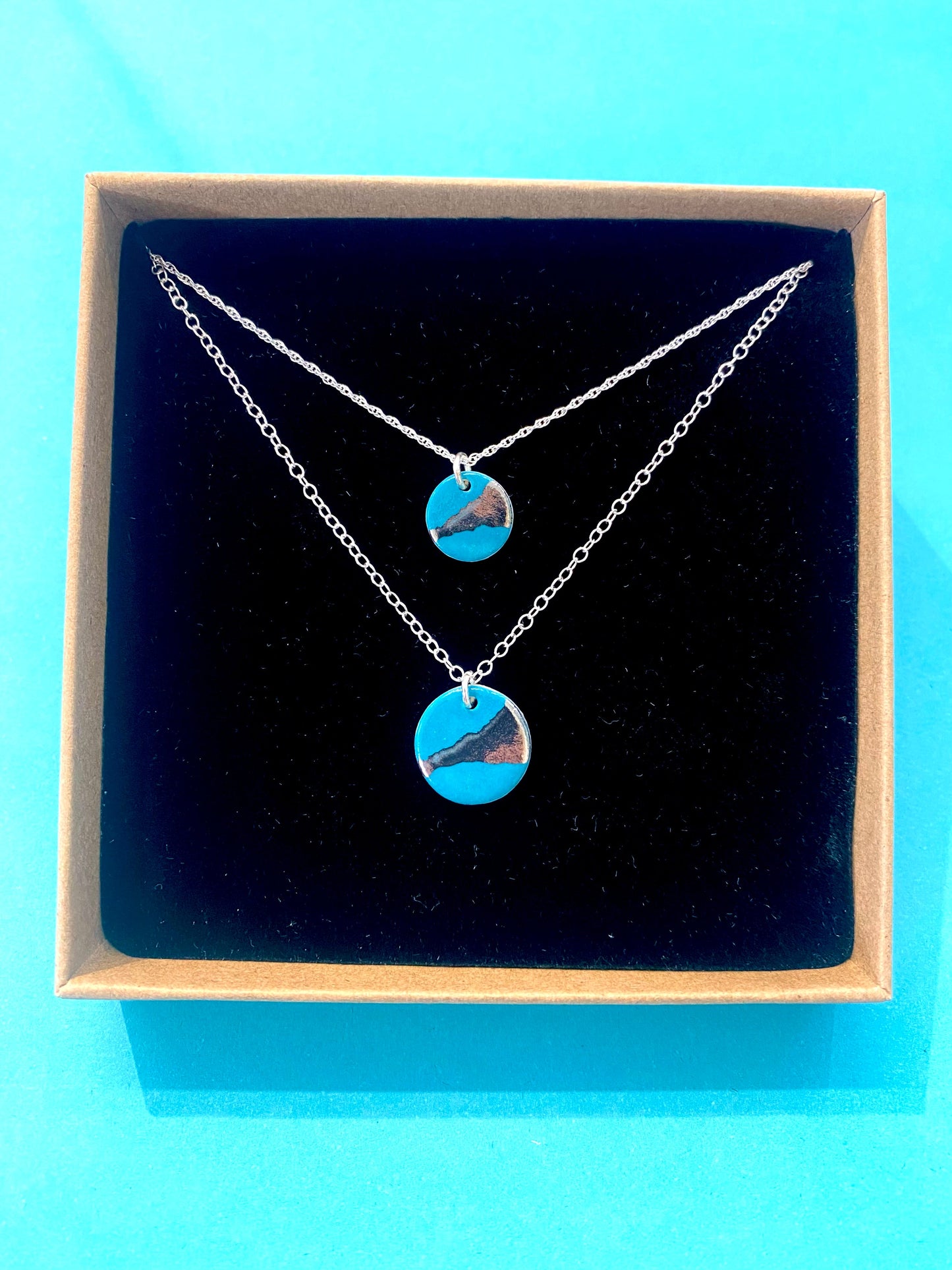 Disc Necklace with Platinum Detailing