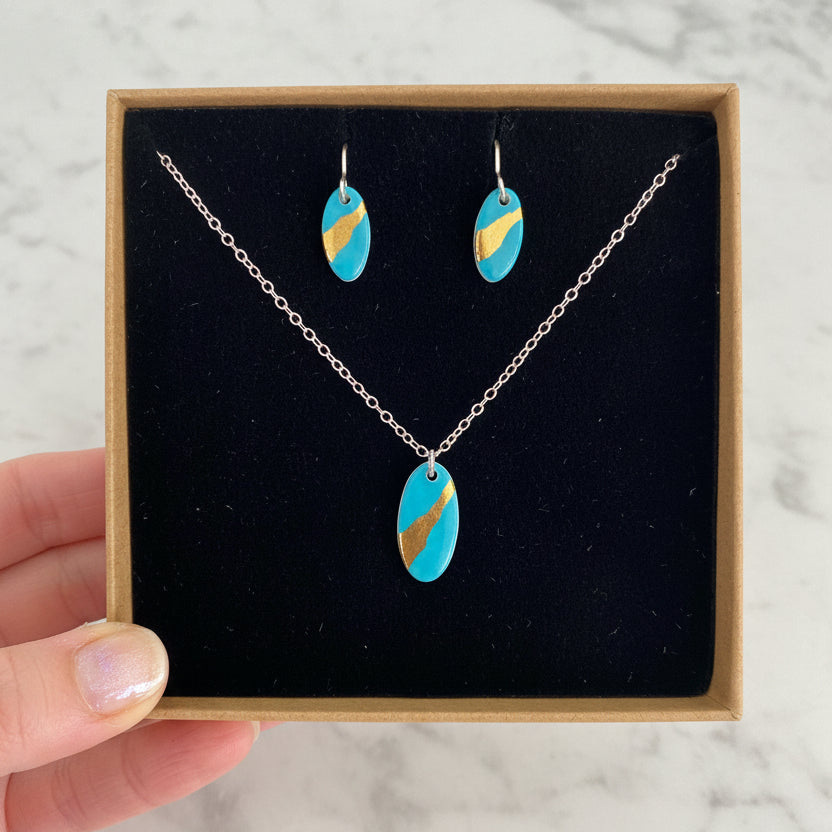Oval Earrings with 24ct Gold Detailing