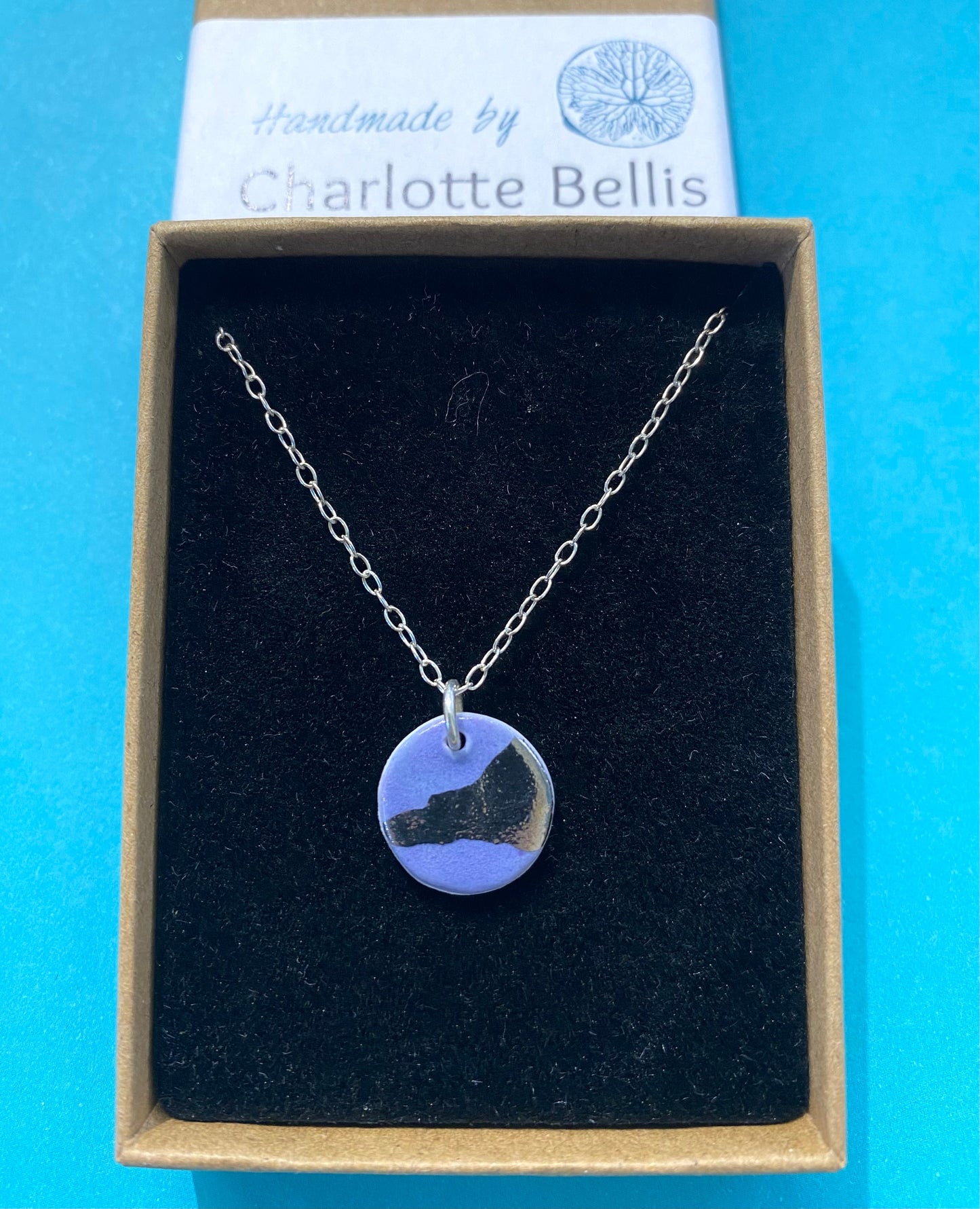 Disc Necklace with Platinum Detailing