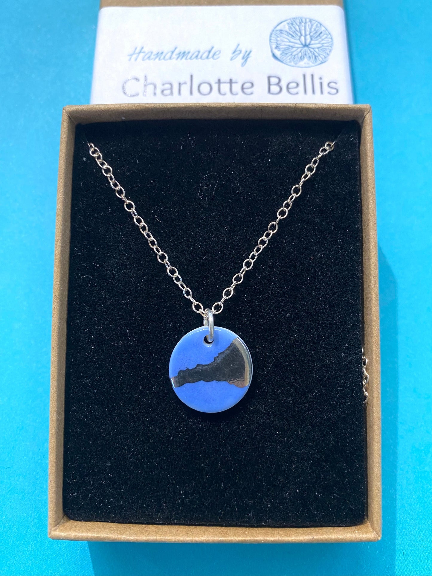 Disc Necklace with Platinum Detailing