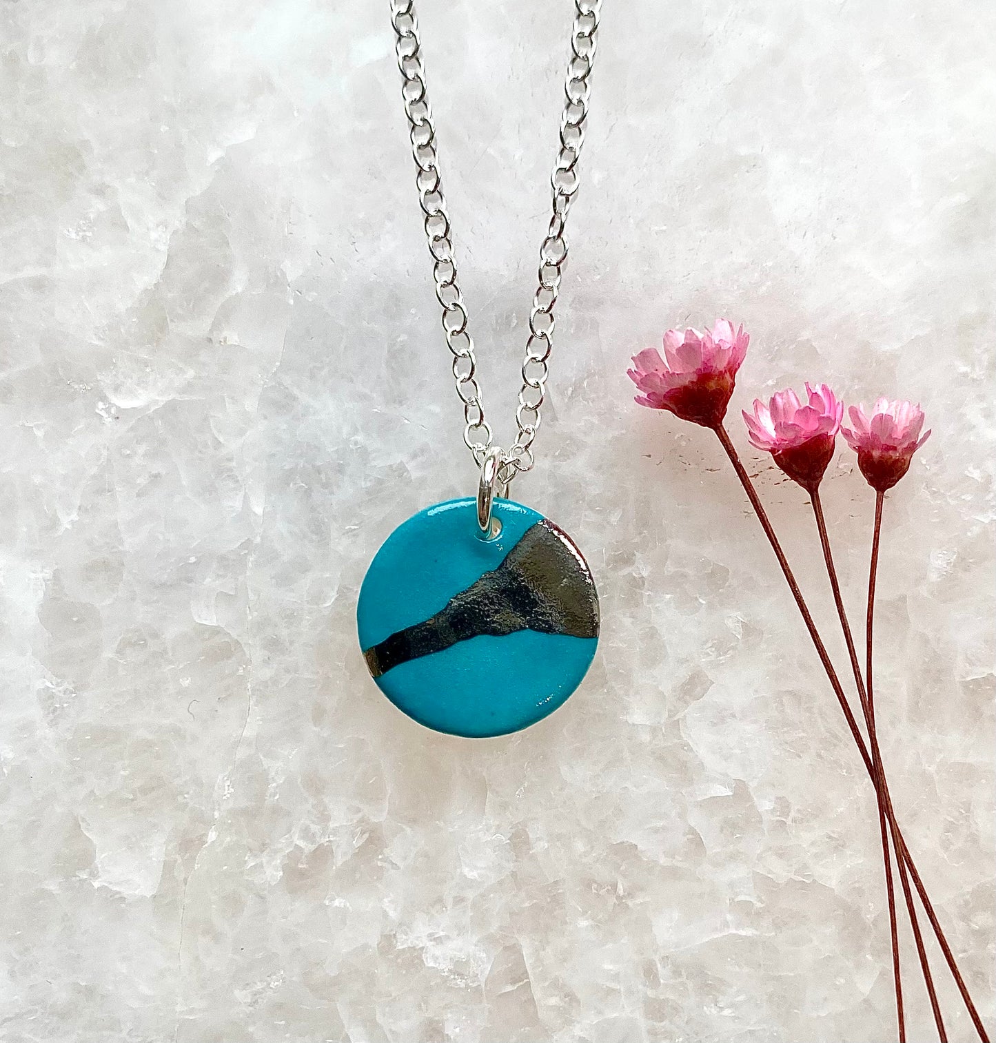 Disc Necklace with Platinum Detailing
