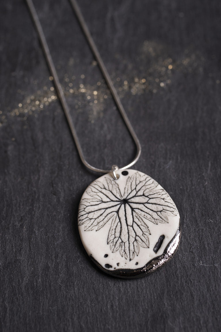Leaf Print Necklace with Platinum Detailing