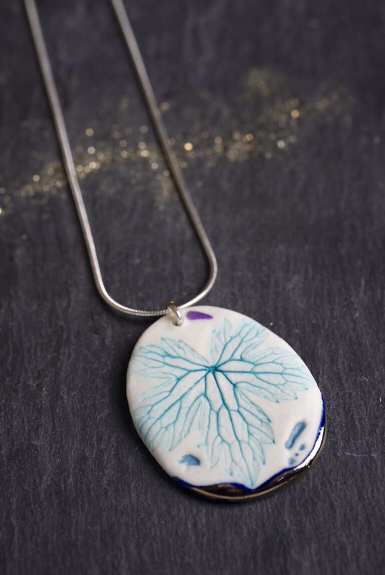 Leaf Print Necklace with Platinum Detailing