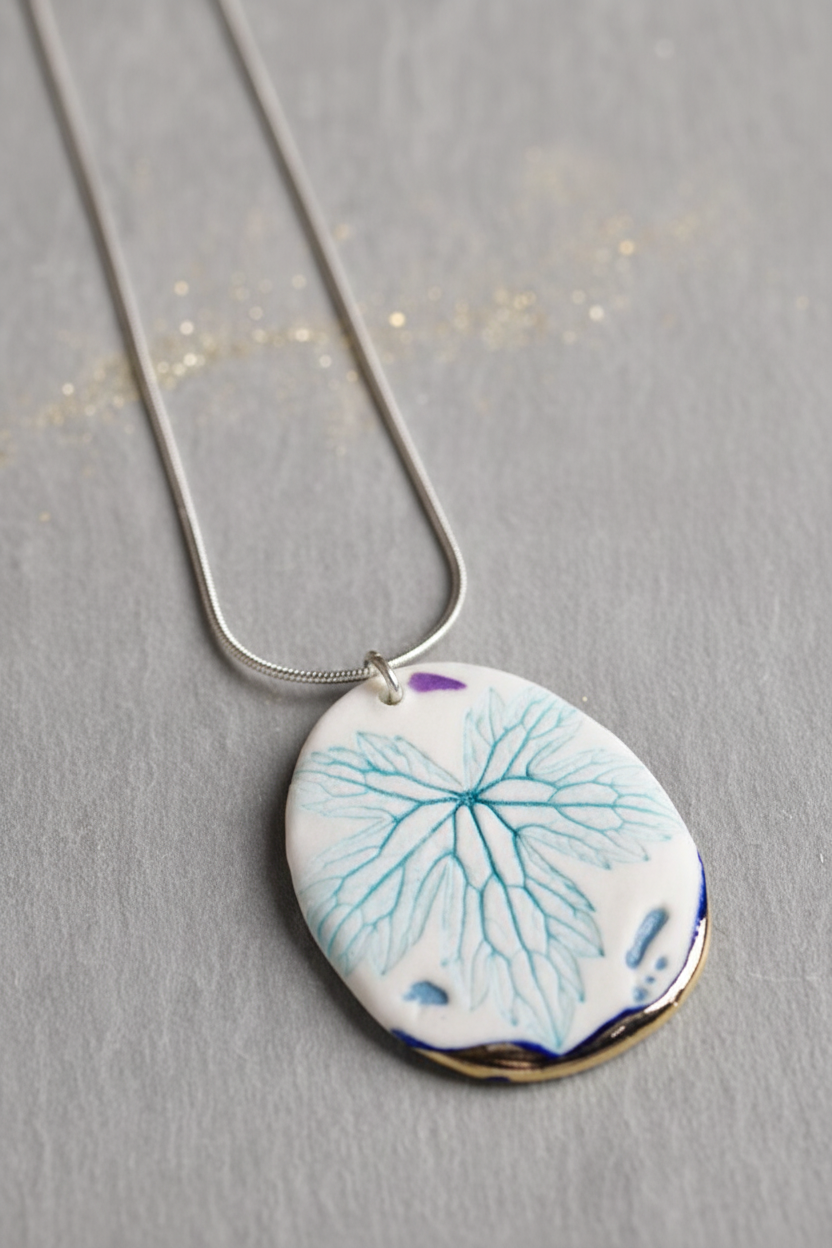 Leaf Print Necklace with Platinum Detailing