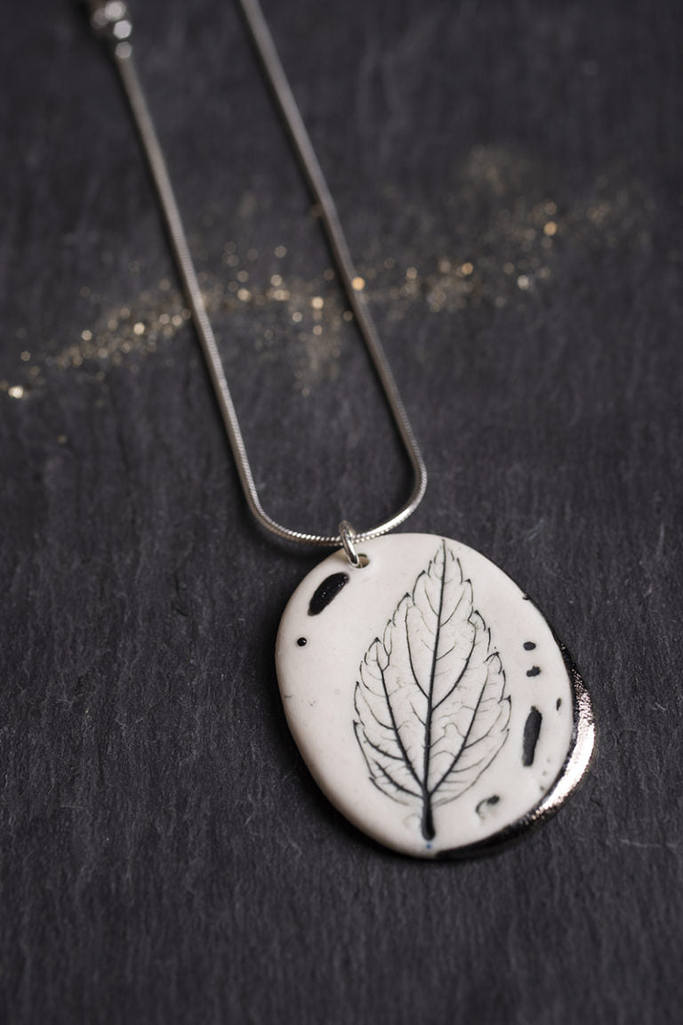Leaf Print Necklace with Platinum Detailing