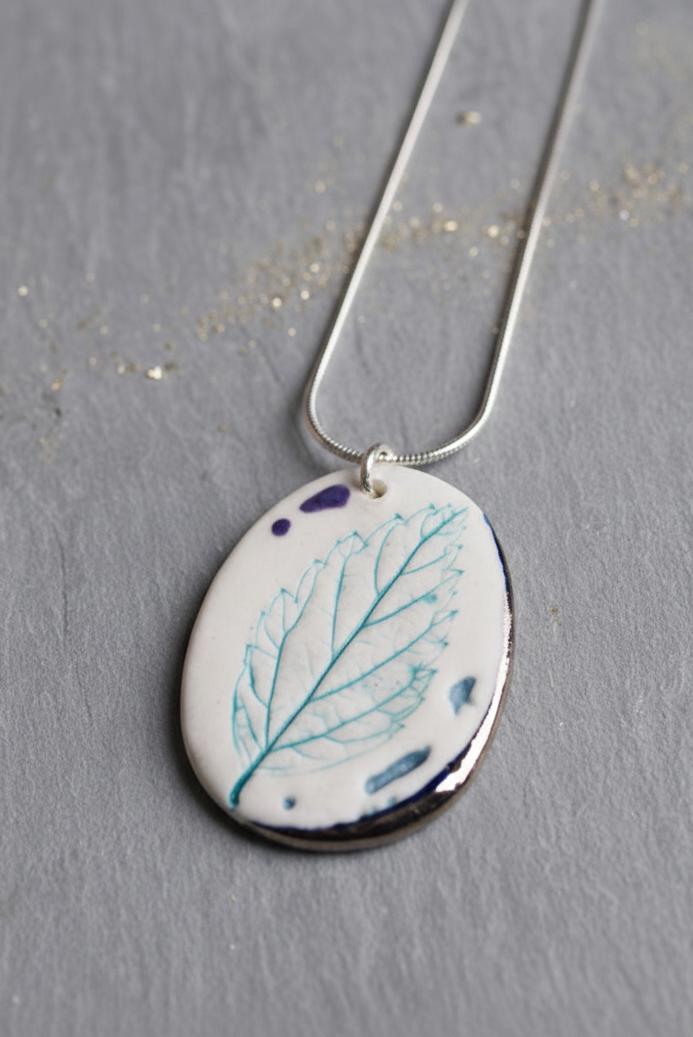Leaf Print Necklace with Platinum Detailing