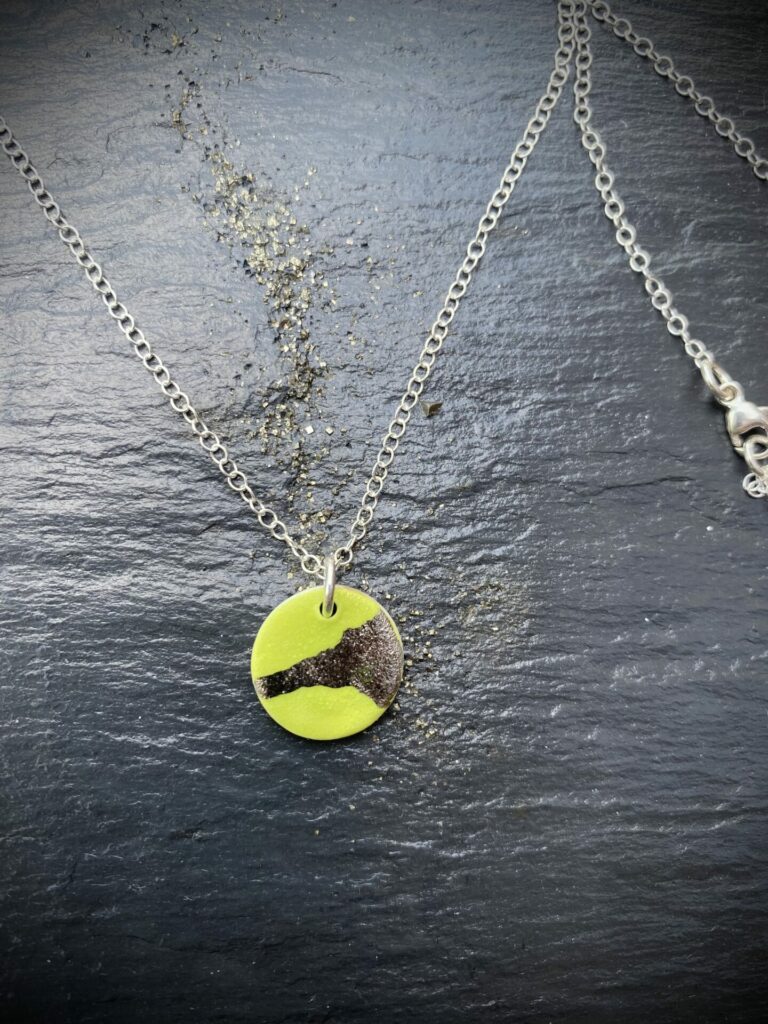 Disc Necklace with Platinum Detailing