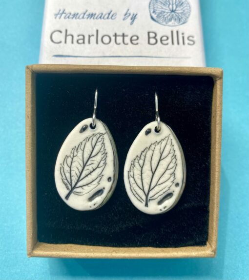 Leaf Print Earrings with Platinum Detailing - Image 4